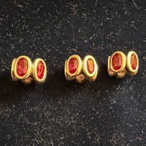 Red stoned and silver bracelet charms